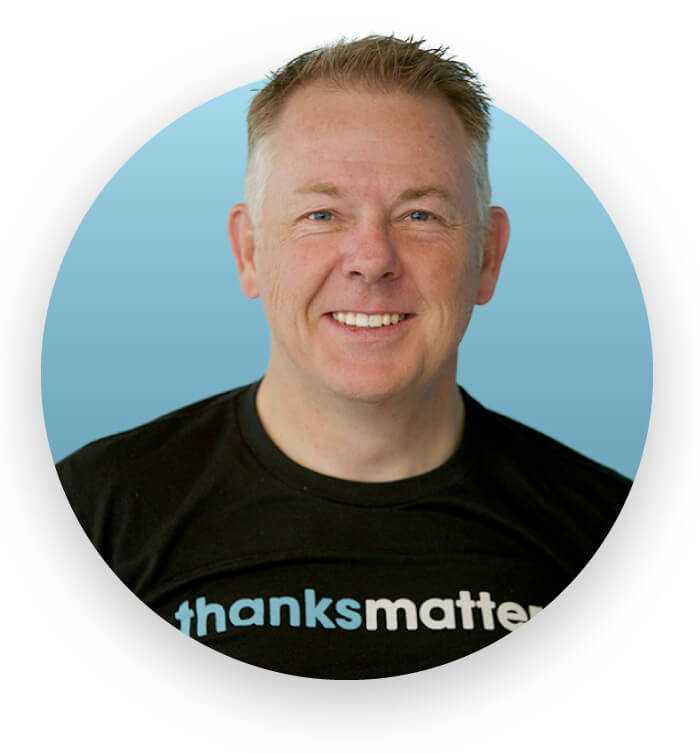 Image of Scott Johnson with a blue circle background.