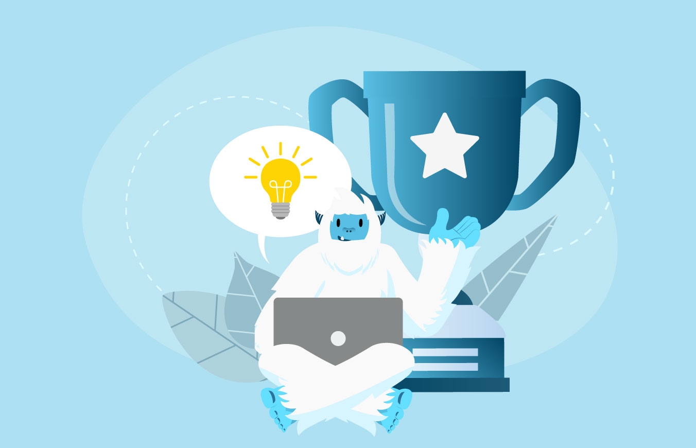 Illustration of Carl the yeti sitting on the floor on his laptop. There is a trophy and lightbulb hovering above him.