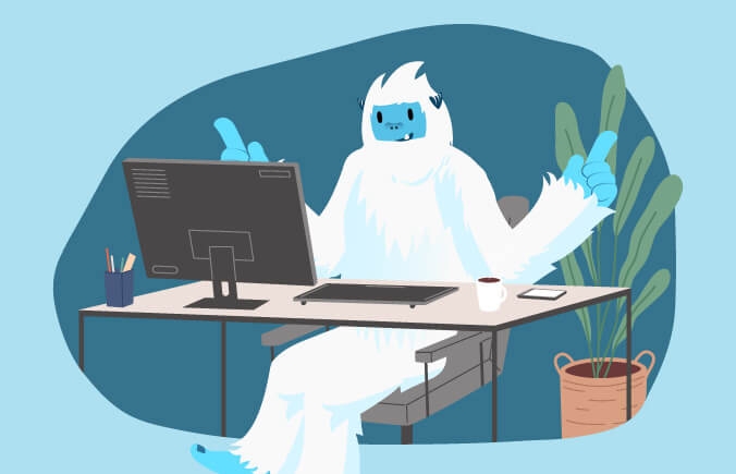Illustration of Carl the yeti sitting happily at a desk with a computer.