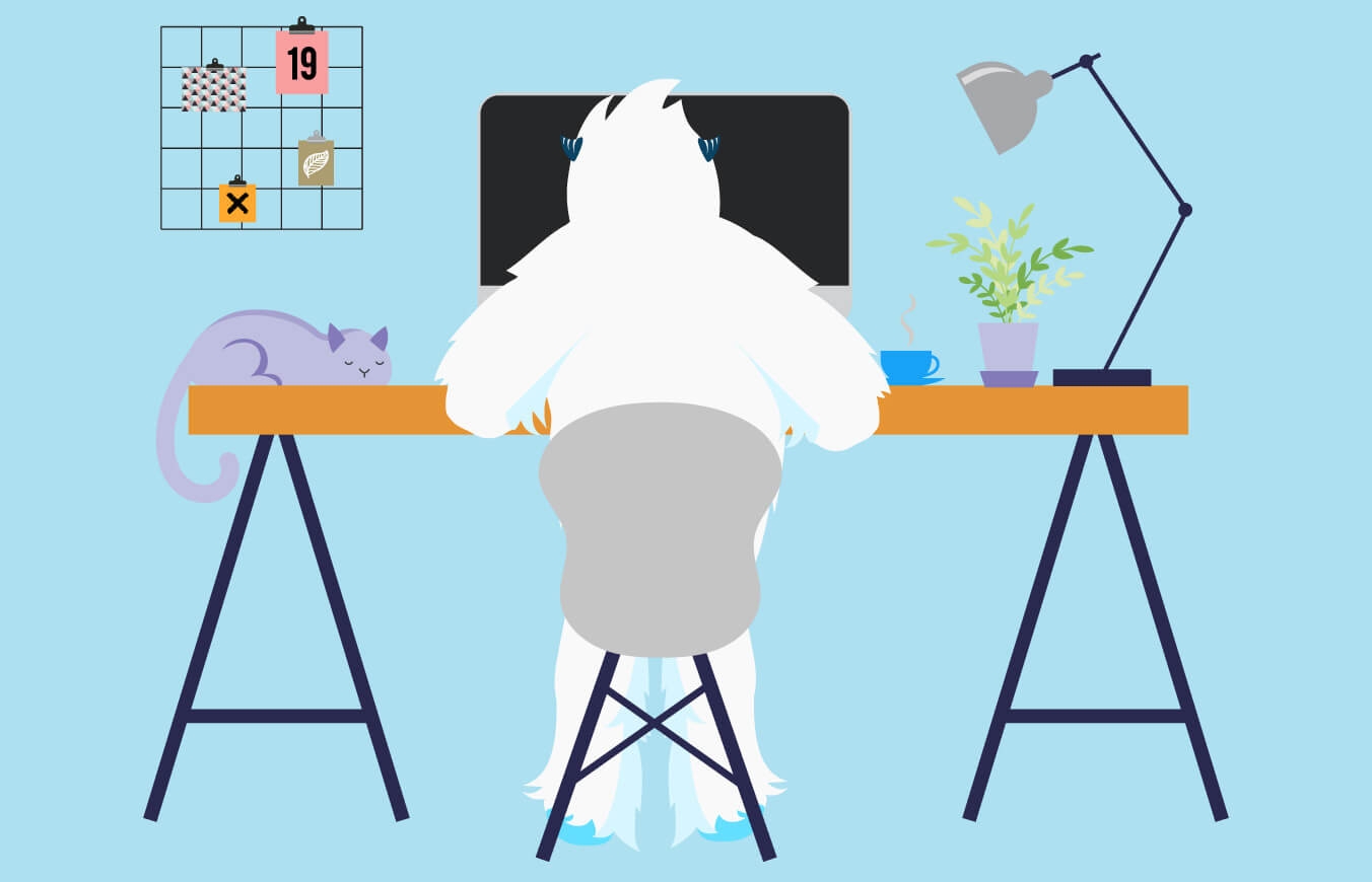 Illustration of Carl the yeti working at a desk.